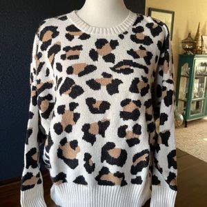 Leopard print partial open-back sweater